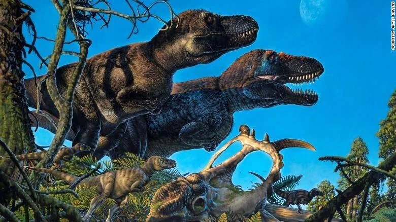 Recreación artística de dos grandes tiranosáuridos con la boca abierta junto a dinosaurios más pequeños en un entorno prehistórico.
