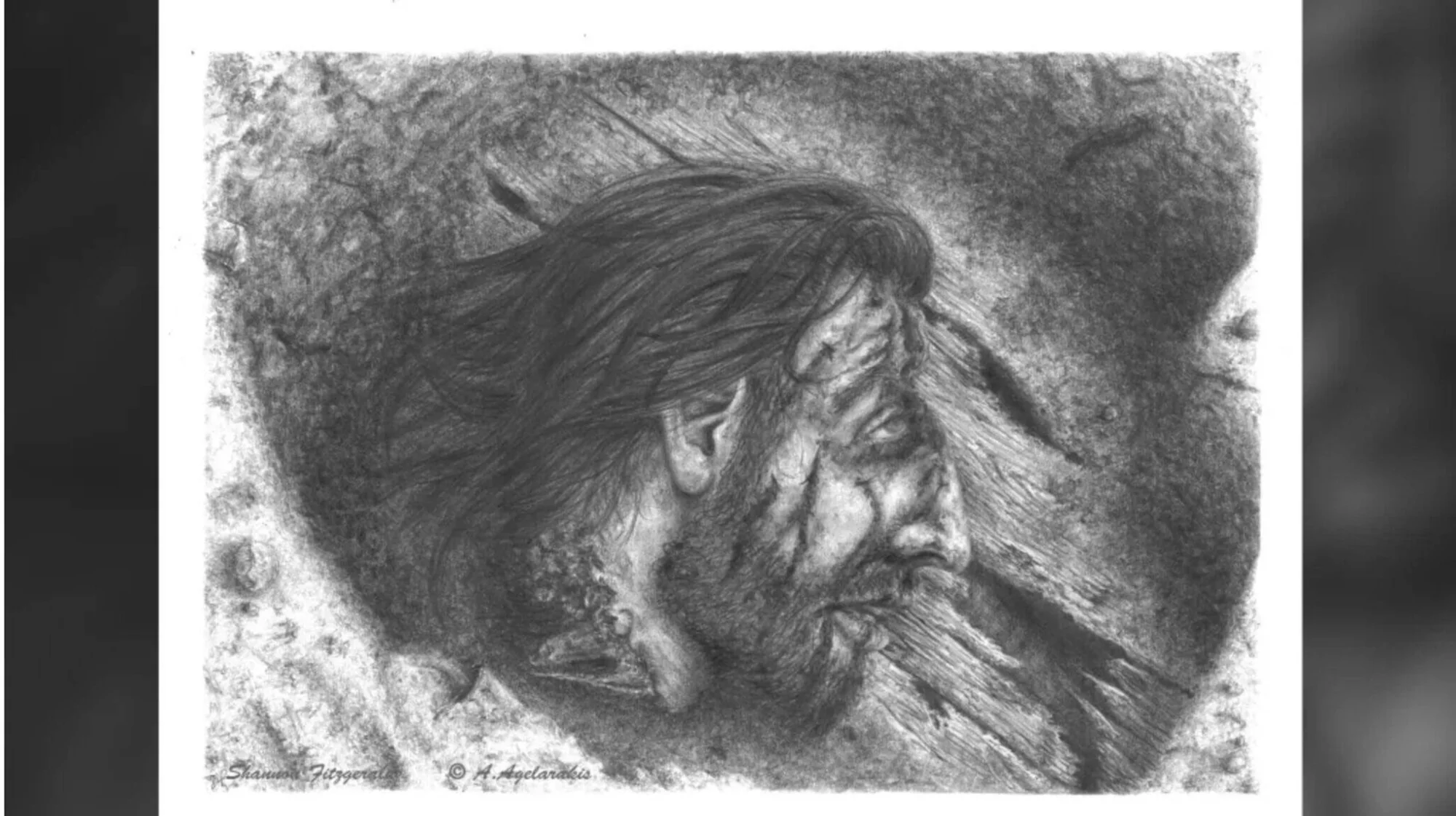 Dibujo a lápiz de un hombre barbado con el cabello agitado por el viento, con expresión intensa, firmado por Shannon Fitzgerald y A. Agelarakis.