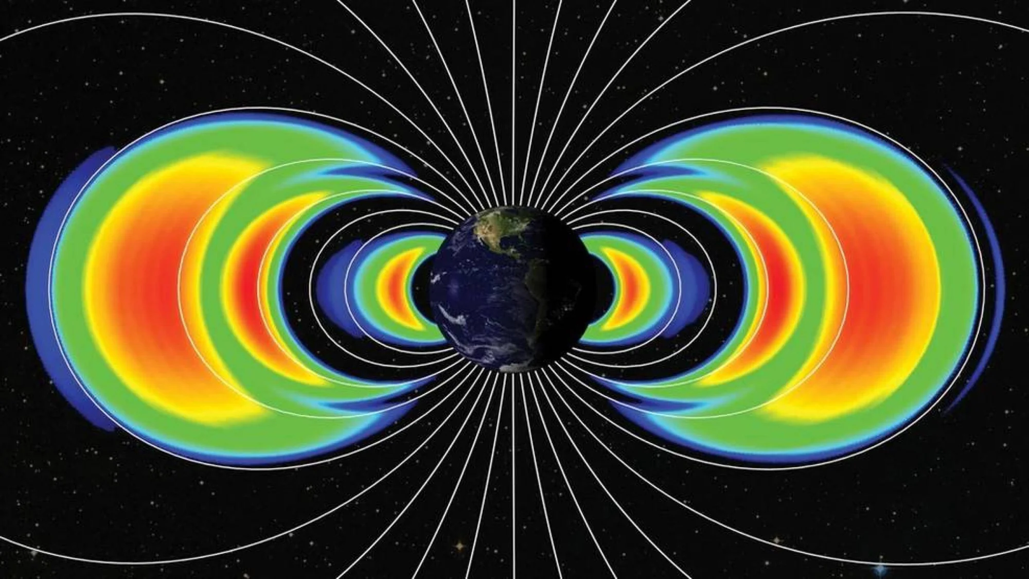 Representación artística de los cinturones de radiación de Van Allen rodeando la Tierra, con líneas de campo magnético y gradiente de colores que indican intensidad.