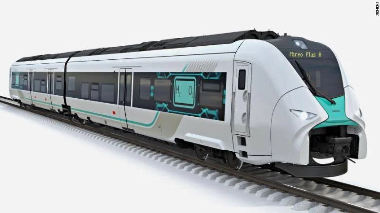 Render del tren de hidrógeno Siemens Mireo Plus H, con diseño moderno en blanco y turquesa y el símbolo H₂O en el lateral.