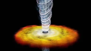 Recreación artística de un agujero negro con disco de acreción naranja y un chorro de plasma helicoidal emergiendo de sus polos.