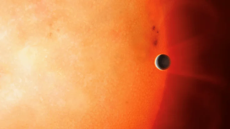 Concepción artística de un exoplaneta similar a Neptuno en órbita muy cercana a una estrella gigante roja.