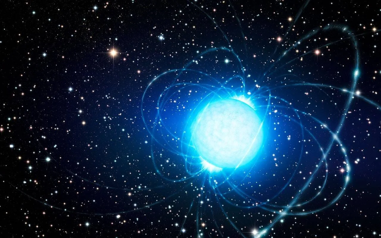 Recreación artística de un magnetar rodeado por líneas de campo magnético azules que se curvan en el espacio estrellado.