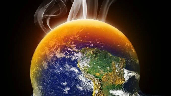 Ilustración conceptual del calentamiento global: la Tierra emite humo y brilla en naranja en su parte superior.