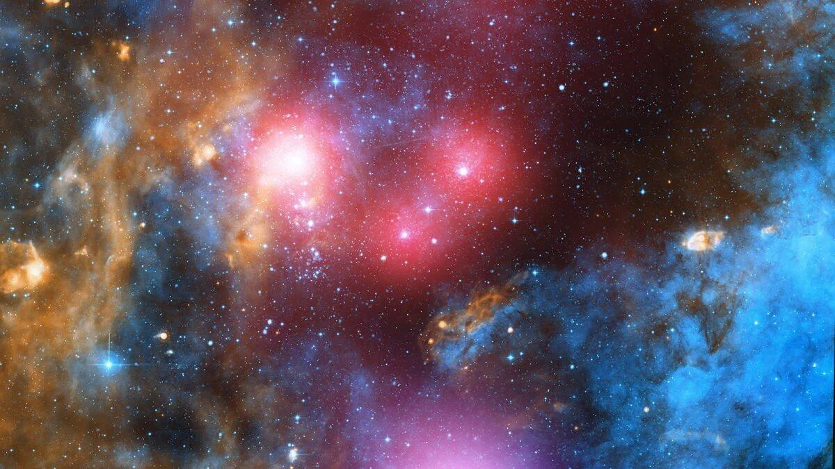 Región del espacio profundo con nubes de gas en tonos rojos, azules y naranjas, estrellas brillantes y nebulosas entrelazadas.