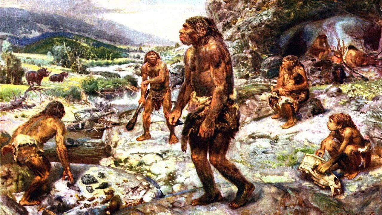 Recreación artística de un grupo de neandertales conviviendo junto a una cueva en un paisaje prehistórico.