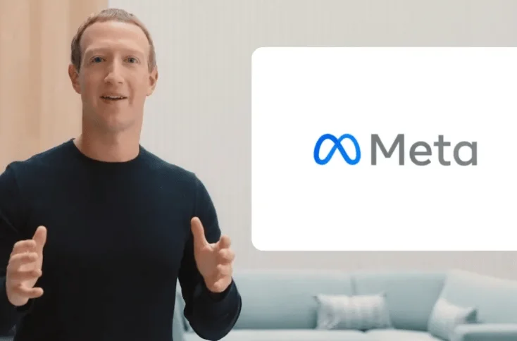 Mark Zuckerberg gesticula frente a una pantalla con el logotipo de Meta durante un anuncio oficial.